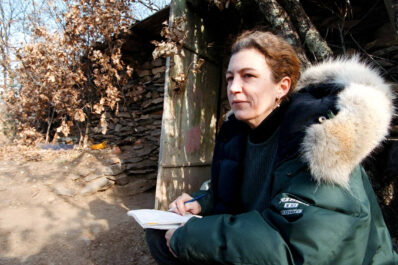 Marie Colvin with a notepad