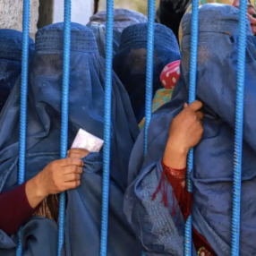 Afghan women wait to receive food aid in Kabul. Two-thirds of Afghanistan’s population are estimated to be in need of humanitarian assistance. Photograph: EPA